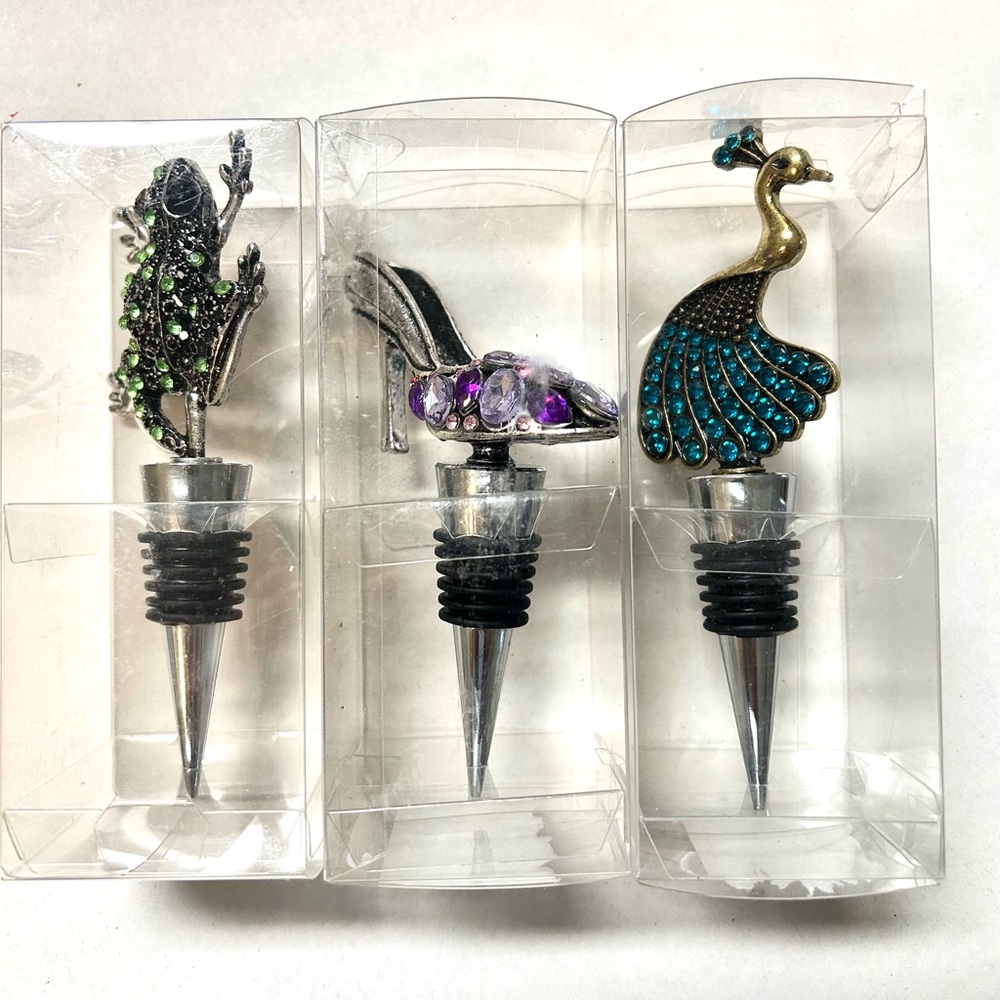 Set of 3 Decorative Wine Stoppers with Animal Designs and one stiletto